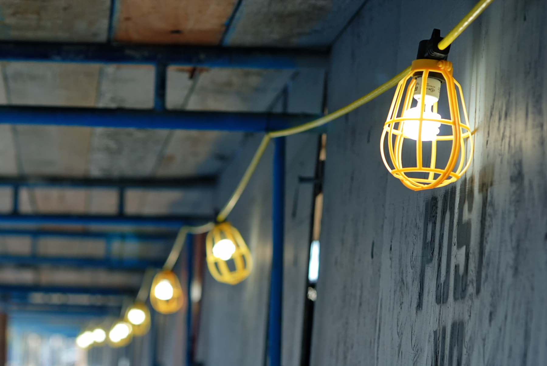 Covered barrier with the lights on at a construction site