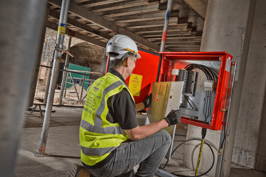 panthera group employee installing temporary electrics