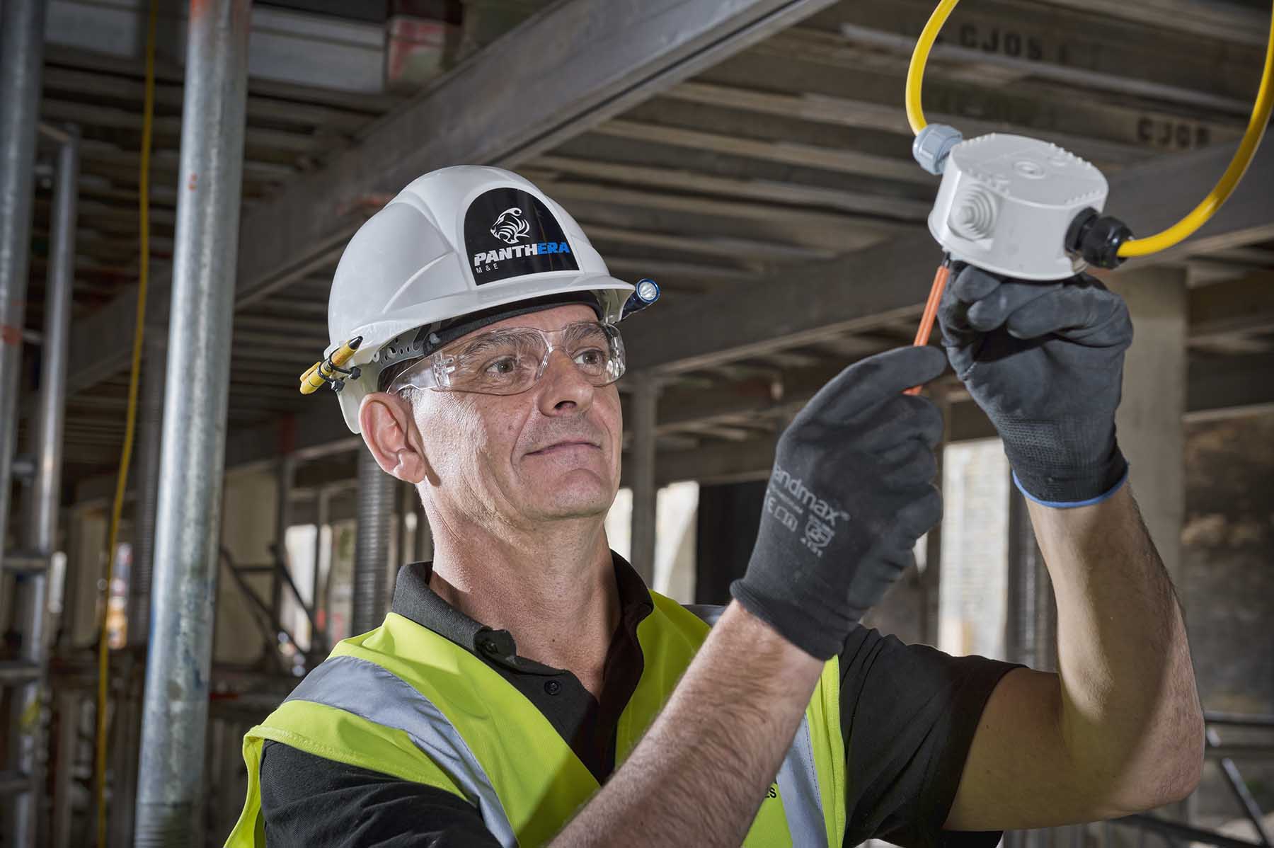 panthera group employee installing temporary electrics