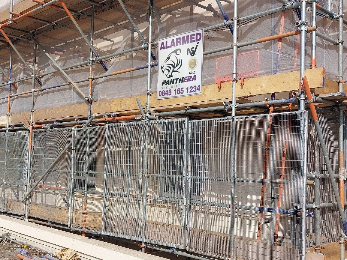 scaffolding with panthera sign