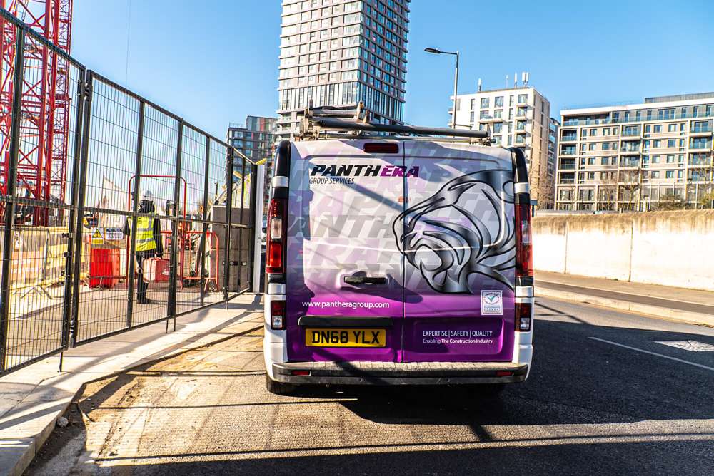 panthera group van next to access gates on construction site